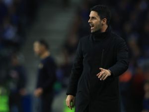 Arsenal's Spanish coach Mikel Arteta reacts during the UEFA Champions League last 16 first leg football match between FC Porto and Arsenal FC at the Dragao stadium in Porto on February 21, 2024. (Photo by PATRICIA DE MELO MOREIRA / AFP)