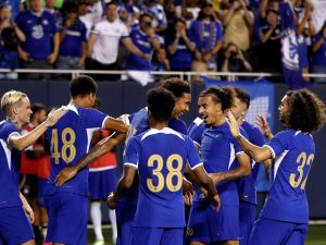 Chelsea's English forward Mason Burstow (2nd L) celebrates scoring his team's first goal during a pre-season friendly football match between Chelsea FC and Borussia Dortmund BVB at Soldier Field in Chicago, Illinois, on August 2, 2023. (Photo by KAMIL KRZACZYNSKI / AFP)
