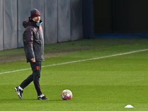 Manchester City's Spanish manager Pep Guardiola attends a training session at Manchester City's training ground in north-west England on February 12, 2024, on the eve of their UEFA Champions League Group round of 16 football match against FC Copenhagen. (Photo by Paul ELLIS / AFP)
