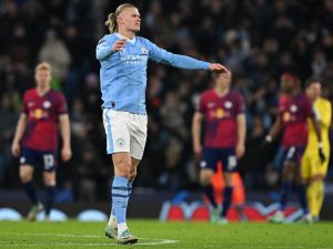 Manchester City's Norwegian striker #09 Erling Haaland celebrates scoring the team's first goal during the UEFA Champions League Group G football match between Manchester City and RG Leipzig at the Etihad Stadium, in Manchester, north west England, on November 28, 2023. (Photo by Paul ELLIS / AFP)
