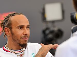 Mercedes' British driver Lewis Hamilton speaks to the press ahead of the Abu Dhabi Formula One Grand Prix at the Yas Marina Circuit in the Emirati city of Abu Dhabi on November 23, 2023. (Photo by Giuseppe CACACE / AFP)