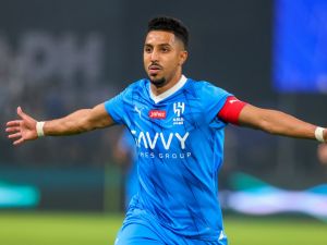 Hilal's Saudi midfielder #29 Salem al-Dawsari celebrates his goal during the Riyadh Season Cup final match between Al-Nassr and Al-Hilal at the Kingdom Arena in Riyadh, on February 8, 2024. (Photo by Fayez Nureldine / AFP)