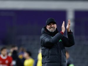 Liverpool's German manager Jurgen Klopp applauds at the end of the UEFA Europa League football match between Union Saint Gilloise and Liverpool FC at the Lotto Park in Brussels on December 14, 2023. (Photo by Kenzo TRIBOUILLARD / AFP)