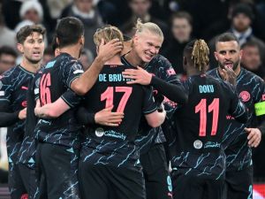 Manchester City's players celebrate during the UEFA Champions League round of 16, first-leg football match between FC Copenhagen and Manchester City in Copenhagen, Denmark, on February 13, 2024. (Photo by Jonathan NACKSTRAND / AFP)