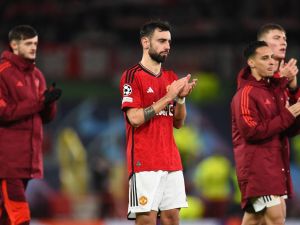 Manchester United's Portuguese midfielder #08 Bruno Fernandes reacts after the UEFA Champions League group A football match between Manchester United and FC Bayern Munich at Old Trafford stadium in Manchester, north west England, on December 12, 2023. (Photo by PETER POWELL / AFP)