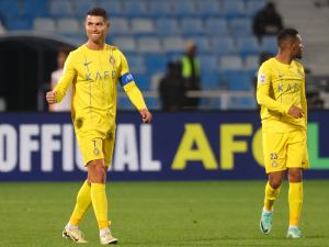 Nassr's Portuguese forward #07 Cristiano Ronaldo celebrates his goal during the AFC Champions League football match between and Saudi Arabia’s Al-Feiha and Saudi Arabia's Al-Nassr at Prince Faisal Bin Fahd Stadium in Riyadh on February 14, 2024. (Photo by Fayez NURELDINE / AFP)