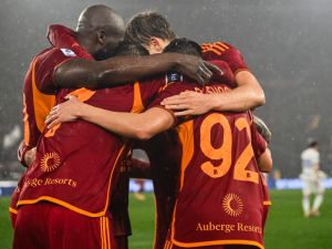 Roma's Italian forward #92 Stephan El Shaarawy (R) celebrates with his teammates after scoring his side's second goal during the Italian Serie A football match between AS Roma and Inter Milan at the Olympic stadium in Rome on February 10, 2024. (Photo by Alberto PIZZOLI / AFP)