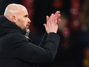 Manchester United's Dutch manager Erik ten Hag claps after the UEFA Champions League group A football match between Manchester United and FC Bayern Munich at Old Trafford stadium in Manchester, north west England, on December 12, 2023. (Photo by PETER POWELL / AFP)