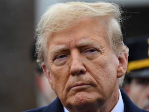 Trump attends wake of slain NYPD officer, taking aim at Biden's policies