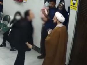Woman attacks Iranian cleric after filming her without full hijab