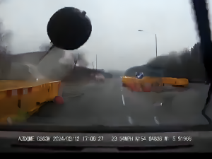 Massive wrecking ball hits woman's vehicle