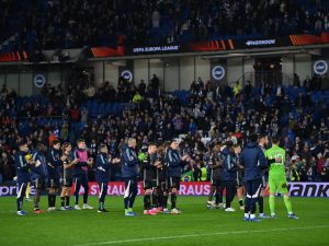 Ajax players applaud their fans after the UEFA Europa League Group B football match between Brighton and Hove Albion and Ajax at the American Express Community Stadium in Brighton, southern England on October 26, 2023. Brighton won the match 2-0. (Photo by Glyn KIRK / AFP)