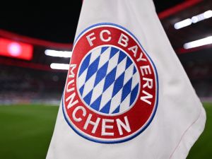 The logo of Bayern Munich is pictured on a corner flag in the Allianz Arena ahead the UEFA Champions League round of 16, second-leg football match between FC Bayern Munich and Lazio in Munich, southern Germany on March 5, 2024. (Photo by Kirill KUDRYAVTSEV / AFP)