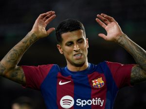 Barcelona's Portuguese defender #02 Joao Cancelo reacts during the Spanish league football match between FC Barcelona and Athletic Club Bilbao at the Estadi Olimpic Lluis Companys in Barcelona on October 22, 2023. (Photo by Josep LAGO / AFP)