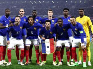 France's players pose for a team photograph ahead of the friendly football match between France and Germany, at the Groupama Stadium in Decines-Charpieu, near Lyon, on March 23, 2024. (Photo by FRANCK FIFE / AFP)