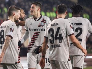 Bayer Leverkusen's Czech forward #14 Patrik Schick (C) celebrates scoring his team's second goal with teammates during the UEFA Europa League round of 16 first leg football match between Qarabag FK and Bayer 04 Leverkusen at Tofiq Bahramov Republican Stadium in Baku on March 7, 2024. (Photo by Giorgi ARJEVANIDZE / AFP)