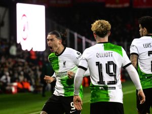 Liverpool's Uruguayan striker #09 Darwin Nunez (L) celebrates scoring his team's third goal with team mates during the UEFA Europa League round of 16 first leg football match between AC Sparta Praha and Liverpool FC in Prague on March 7, 2024. (Photo by Michal Cizek / AFP)