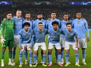 Man City's players pose for a team photo before the UEFA Champions League round of 16, second-leg, football match between Manchester City and FC Copenhagen at the Etihad Stadium, in Manchester, north west England, on March 6, 2024. (Photo by Oli SCARFF / AFP)