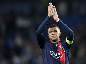 Paris Saint-Germain's French forward #07 Kylian Mbappe applauds at the end of the UEFA Champions League last 16 second leg football match between Real Sociedad and Paris Saint-Germain (PSG) at the Anoeta stadium in San Sebastian on March 5, 2024. (Photo by FRANCK FIFE / AFP)