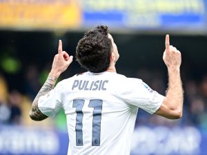 AC Milan's American forward #11 Christian Pulisic celebrates after scoring his team second goal during the Italian Serie A football match between Hellas Verona and AC Milan, at the Marcantonio Bentegodi stadium, in Verona, on March 17, 2024. (Photo by Piero CRUCIATTI / AFP)
