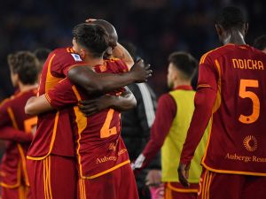 Roma's Belgian midfielder #90 Romelu Lukaku (L) congratulates teammate Roma's Argentine forward #21 Paulo Dybala after winning 3-2 the Italian Serie A football match between AS Roma and Torino on February 26, 2024 at the Olympic stadium in Rome. (Photo by Tiziana FABI / AFP)