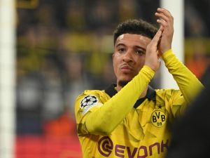 Dortmund's English midfielder #10 Jadon Sancho applauds the fans as he goes off injured during the UEFA Champions League last 16, second-leg football match BVB Borussia Dortmund v PSV Eindhoven at the Signal Iduna stadium in Dortmund, western Germany on March 13, 2024. (Photo by INA FASSBENDER / AFP)