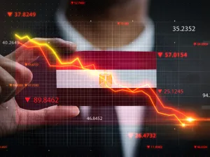 Egypt devalues its pound with record interest rate hike