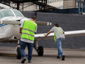 Airport personnel push private jet to start at Cappadocia airport