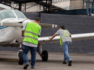 Airport personnel push private jet to start at Cappadocia airport