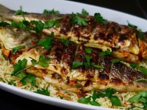 تفسير رؤية الميت يأكل السمك في المنام
