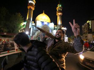 Thousands of Iranians celebrate attack on Israel