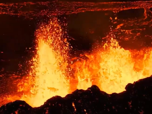 Dancing northern lights amid volcanic explosions in Iceland