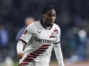 Bayer Leverkusen's Dutch defender #30 Jeremie Frimpong runs with the ball during the UEFA Europa League round of 16 first leg football match between Qarabag FK and Bayer 04 Leverkusen at Tofiq Bahramov Republican Stadium in Baku on March 7, 2024. (Photo by Giorgi ARJEVANIDZE / AFP)