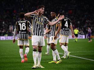Juventus' Serbian forward #09 Dusan Vlahovic celebrates before his goal was denied by VAR due to offside during the Italian Serie A football match between Juventus and Fiorentina, at The Allianz Stadium, in Turin on April 7, 2024. (Photo by Marco BERTORELLO / AFP)