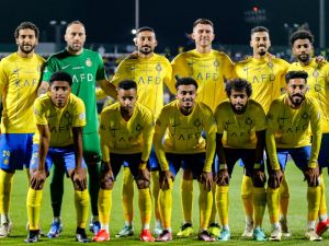 Nassr's starting eleven pose for the group photo before the start of the Saudi Pro League football match between Damac FC and Al-Nassr FC at Prince Sultan bin Abdulaziz Sports City stadium in Abha on April 5, 2024. (Photo by Mohammed ALSHEHRI / AFP)