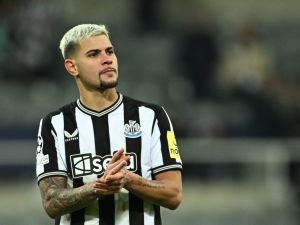 Newcastle United's Brazilian midfielder #39 Bruno Guimaraes applauds at the end of the UEFA Champions League Group F football match between Newcastle United and AC Milan at St James' Park in Newcastle-upon-Tyne, north east England on December 13, 2023. AC Milan wins 2 - 1 against Newcastle United and qualifies for the Champions League last 16. (Photo by Paul ELLIS / AFP)