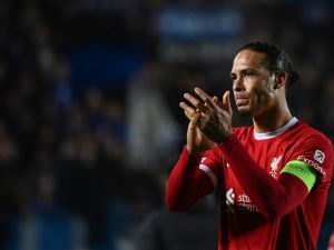 Liverpool's Dutch defender #4 Virgil van Dijk acknowledges the fans after the team lost in the UEFA Europa League quarter-final second leg football match between Atalanta BC and Liverpool FC at the Atleti Azzurri d'Italia Stadium in Bergamo, on April 18, 2024. Liverpool were knocked out of the Europa League by Atalanta with the Italian side reaching the semi-finals 3-1 on aggregate on April 18, 2024. (Photo by Isabella BONOTTO / AFP)