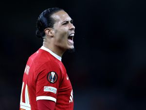Liverpool's Dutch defender #04 Virgil van Dijk shouts during the UEFA Europa League quarter-final first leg football match between Liverpool and Atalanta at Anfield in Liverpool, north west England on April 11, 2024. (Photo by Darren Staples / AFP)