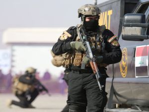 صورة تعبيرية يظهر فيها عناصر من الشرطة العراقية