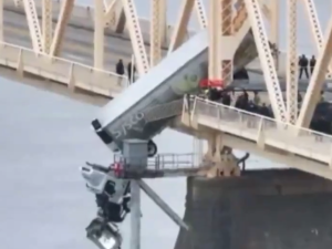  truck hanging off bridge 
