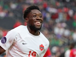 Alphonso Davies #19 of Canada reacts after scoring a goal against Panama in the second half of their game during the 2023 CONCACAF Nations League semifinals at Allegiant Stadium on June 15, 2023 in Las Vegas, Nevada. Canada defeated Panama 2-0. Ethan Miller/Getty Images/AFP (Photo by Ethan Miller / GETTY IMAGES NORTH AMERICA / Getty Images via AFP)