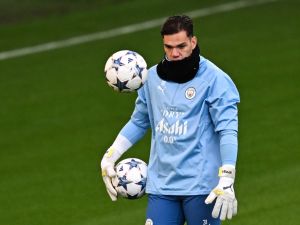 Manchester City's Brazilian goalkeeper Ederson attends a team training session at Manchester City's training ground in north-west England on November 27, 2023, ahead of their UEFA Champions League Group G football match against RB Leipzig. (Photo by Paul ELLIS / AFP)