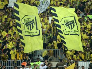 Ittihad's fans cheer for their team during the Saudi Pro League football match between Al-Ittihad and Al-Hilal at Prince Abdullah al-Faisal Stadium in Jeddah on September 1, 2023. (Photo by AFP)