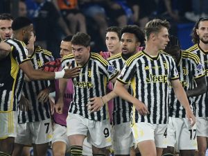 Juventus' Serbian forward #09 Dusan Vlahovic celebrates with teammates after scoring his team first goal during the Italian Cup Final between Atalanta and Juventus at the Olympic stadium in Rome on May 15, 2024. (Photo by Filippo MONTEFORTE / AFP)