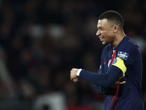 Paris Saint-Germain's French forward #07 Kylian Mbappe reacts during the French Cup (Coupe de France) quarter-final football match between Paris Saint-Germain (PSG) and OGC Nice at the Parc des Princes stadium, in Paris, on March 13, 2024. (Photo by FRANCK FIFE / AFP)
