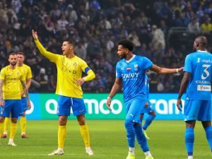 Nassr's Portuguese forward #07 Cristiano Ronaldo (3rd-L) reacts during the Riyadh Season Cup final match between Al-Nassr and Al-Hilal at the Kingdom Arena in Riyadh, on February 8, 2024. (Photo by Fayez Nureldine / AFP)
