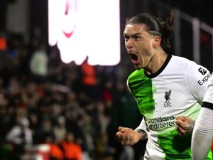 Liverpool's Uruguayan striker #09 Darwin Nunez celebrates scoring his team's third goal during the UEFA Europa League round of 16 first leg football match between AC Sparta Praha and Liverpool FC in Prague on March 7, 2024. (Photo by Michal Cizek / AFP)