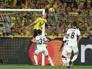 Dortmund's German forward #14 Niclas Fuellkrug (top L) makes an attempt on goal during the UEFA Champions League semi-final first leg football match between Borussia Dortmund and Paris Saint-Germain (PSG) in Dortmund, western Germany on May 1, 2024. (Photo by FRANCK FIFE / AFP)