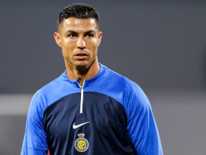 Nassr's Portuguese forward #07 Cristiano Ronaldo looks on as he warms up before the Saudi Pro League football match between Damac FC and Al-Nassr FC at Prince Sultan bin Abdulaziz Sports City stadium in Abha on April 5, 2024. (Photo by Mohammed ALSHEHRI / AFP)