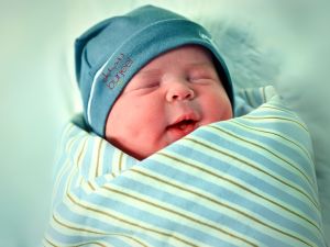 Baby Humam, born to Jordanian parents, arrived exactly at 12:00 AM on the special day